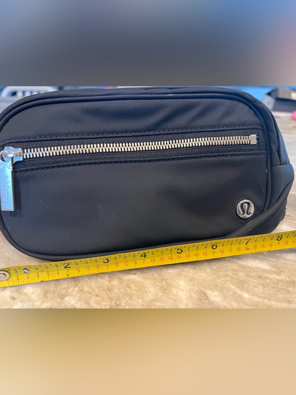 Lululemon black Fanny pack. Front zipper for storage